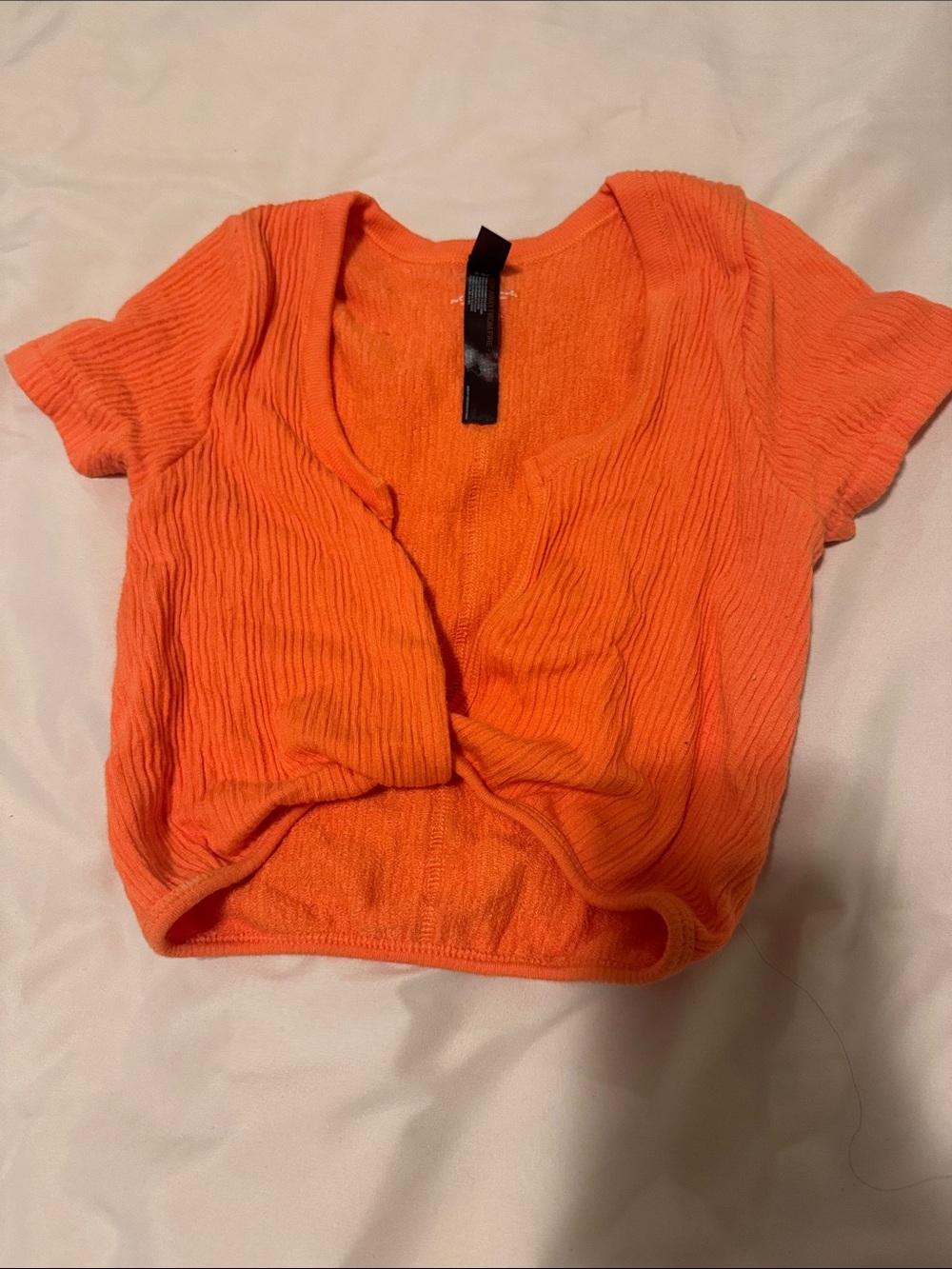 Out from under twist top orange